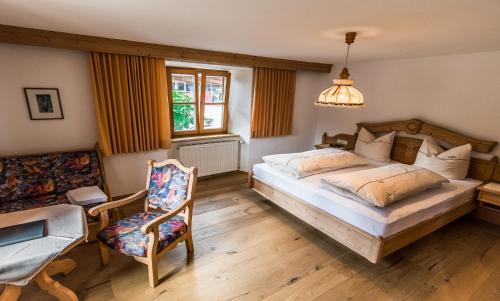Voodi või voodid majutusasutuse Hotel zum Goldenen Löwen toas