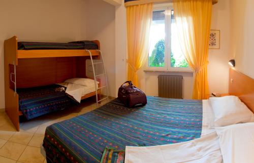 A bed or beds in a room at Residence Sant'Anna