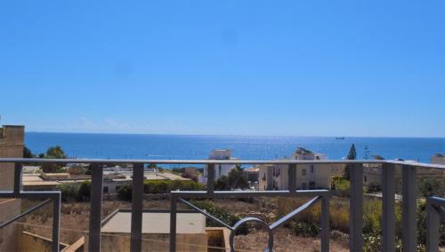 a view of the ocean from the balcony of a house at Ullswater No. 9 in Marsaskala