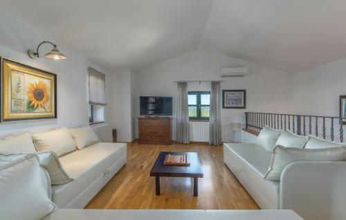 a living room with a couch and a coffee table at Villa Luna in Selina in Selina