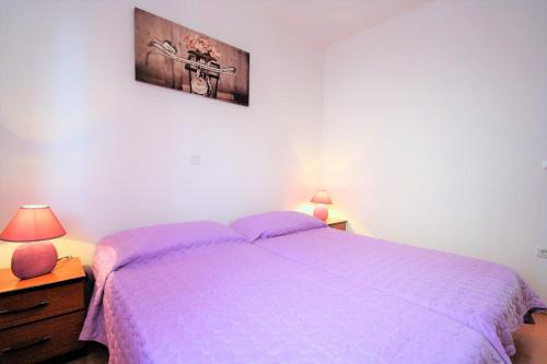 Postel nebo postele na pokoji v ubytování Apartment Mendikovic