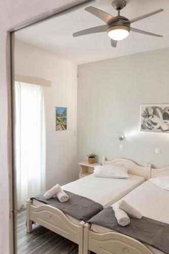 Postel nebo postele na pokoji v ubytování Apartments Tarsa