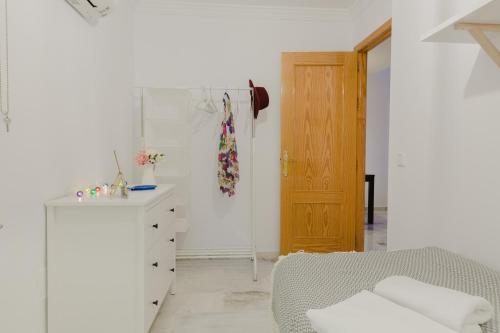 Giường trong phòng chung tại Hola Málaga Atarazanas