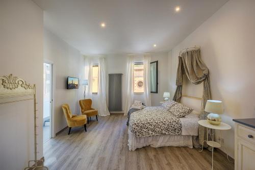 Posteľ alebo postele v izbe v ubytovaní Siena Vip B&B