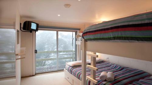 En eller flere senge i et værelse på 8 Maisonettes