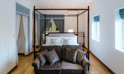 En eller flere senge i et værelse på Baan Vajra