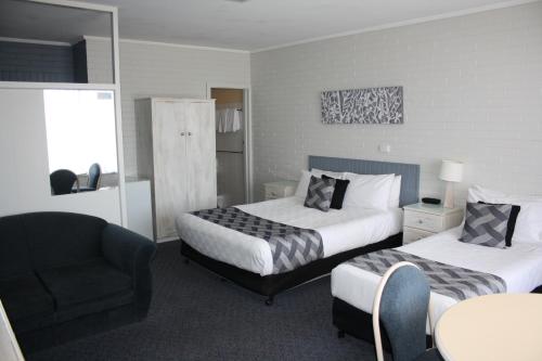 Ένα ή περισσότερα κρεβάτια σε δωμάτιο στο Comfort Inn Robe