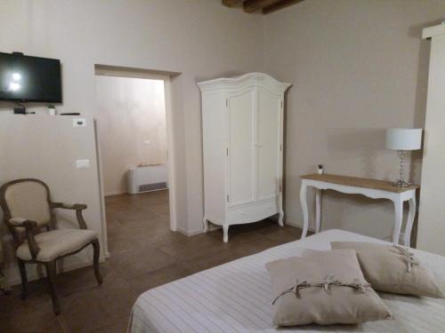 Postel nebo postele na pokoji v ubytování Agriturismo Vitae