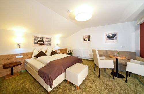 En eller flere senge i et værelse på Lieblingsplatz Tirolerhof