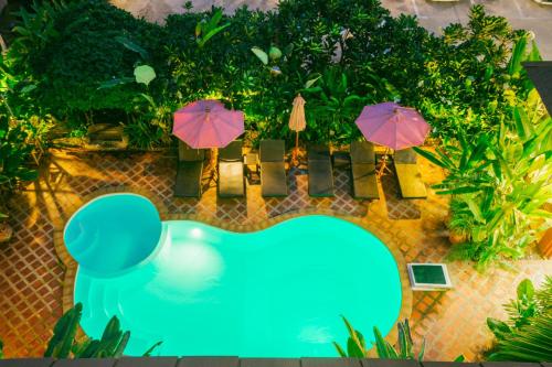 Вид на бассейн в The Odyssey Chiang Mai или окрестностях