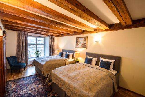 Posteľ alebo postele v izbe v ubytovaní Tallinn City Apartments Luxury 4 bedroom with terrace and sauna
