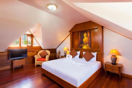Ein Bett oder Betten in einem Zimmer der Unterkunft Royal Prince Residence