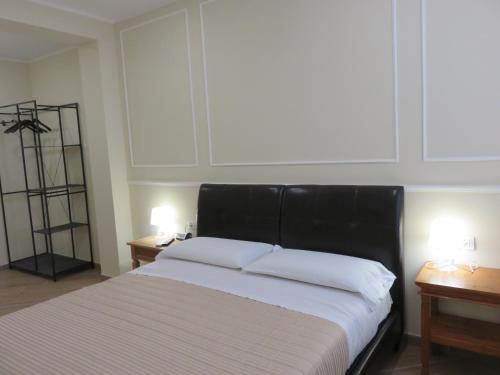 Cama o camas de una habitación en Scaligero Rooms