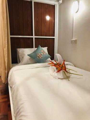 Ένα ή περισσότερα κρεβάτια σε δωμάτιο στο Sanga Hostel