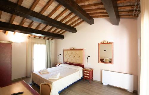 Voodi või voodid majutusasutuse Borgo Rossi toas