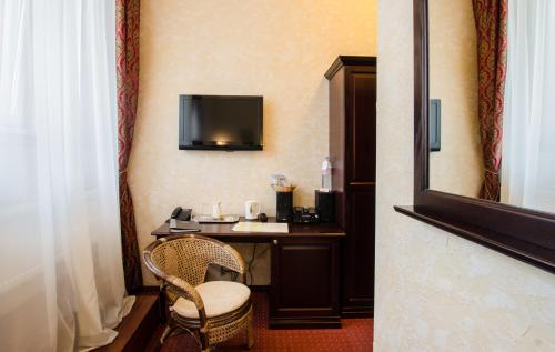 TV a/nebo společenská místnost v ubytování Boutique Hotel Monte Kristo
