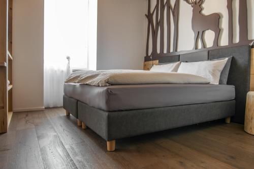 Postel nebo postele na pokoji v ubytování La Filanda Relax&Gourmet