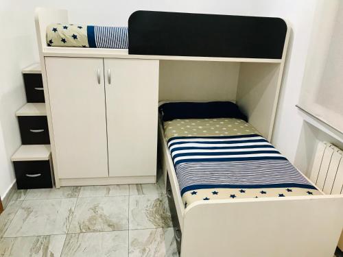 Cama o camas de una habitación en Best apartment near REAL MADRID Stadium