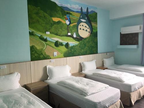 Tempat tidur dalam kamar di Light Blue Hostel