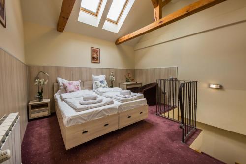 Кровать или кровати в номере Eden Grand Resort