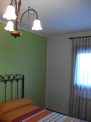 Katil atau katil-katil dalam bilik di Apartamentos Arcos de Solana