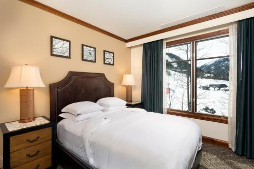 מיטה או מיטות בחדר ב-Ritz Carlton, Aspen Highlands