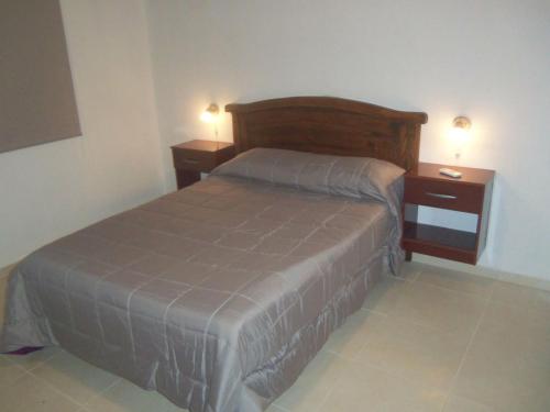 
Una cama o camas en una habitación de Lomas de Belgrano
