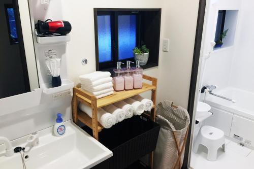 Koupelna v ubytování Guesthouse Mio