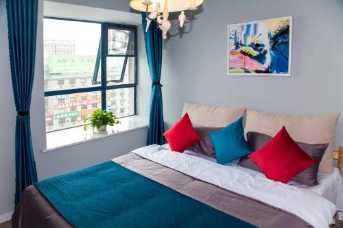 Taian·Taishan·Mount Tai Scenic Spot· Locals Apartment 00123250 tesisinde bir odada yatak veya yataklar