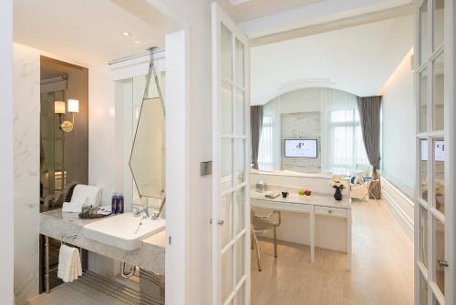 Koupelna v ubytování De Princess Hotel Udonthani