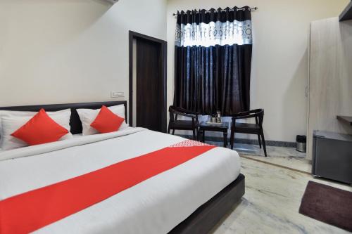 Tempat tidur dalam kamar di Hotel Delight