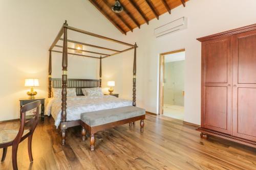 Ένα ή περισσότερα κρεβάτια σε δωμάτιο στο Niketh Villa Kandy
