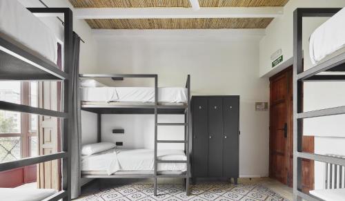 Postel nebo postele na pokoji v ubytování The Boc Hostels - Palma