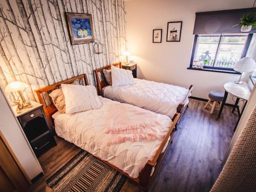 Katil atau katil-katil dalam bilik di Saint-Quirin Garden Stay