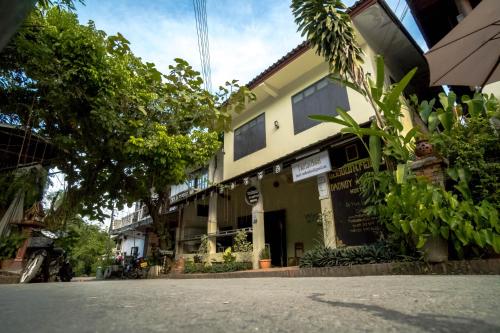 a building on the side of a street at Y Not Laos Hostel in Luang Prabang