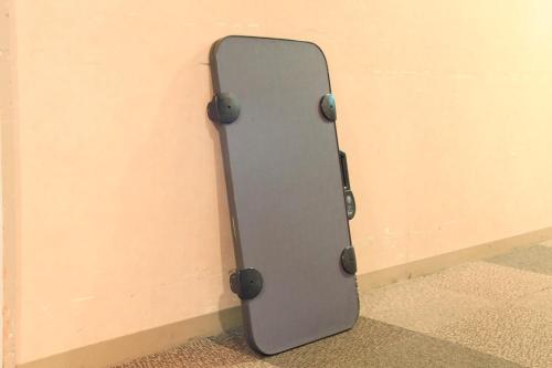 a skateboard is leaning against a wall at Fuji Green Hotel in Fuji