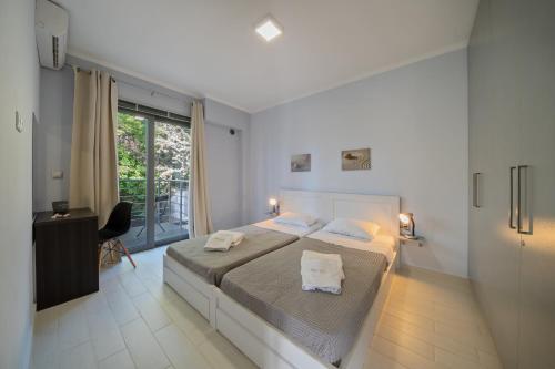 Katil atau katil-katil dalam bilik di Alexiszorba Villa
