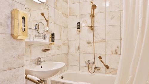 Koupelna v ubytování Hotel Neckarlux