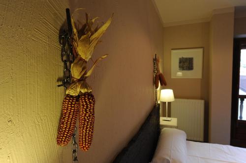a head board of a bed in a bedroom at Posada Rural Bistruey in Potes