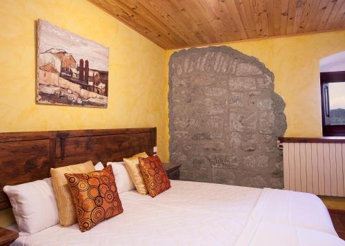 Postel nebo postele na pokoji v ubytování Casa rural Sant Grau turismo saludable y responsable