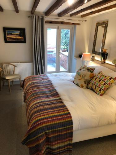 Postel nebo postele na pokoji v ubytování Thames Edge Rooms