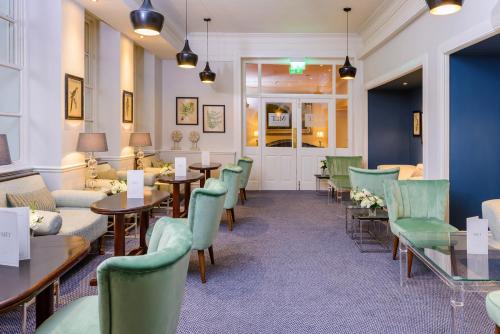 
A restaurant or other place to eat at The Metropole Hotel Cork
