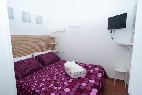 Säng eller sängar i ett rum på Simpa Apartment