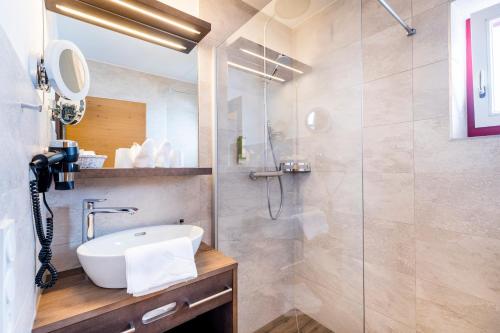 Ένα μπάνιο στο Hotel Alpenland