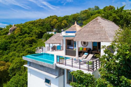 an aerial view of a villa with a swimming pool at Villas Sabai Jai in Koh Tao