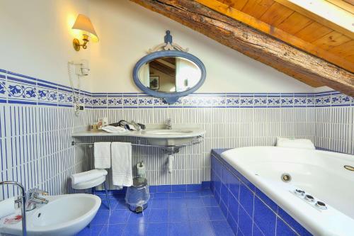 Ett badrum på Best Western Hotel Piemontese