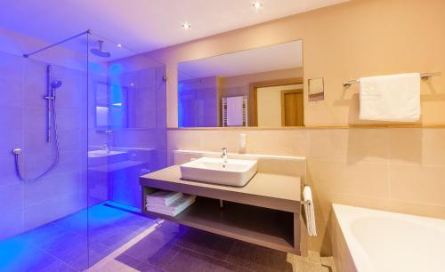 Koupelna v ubytování Hotel Hasslhof