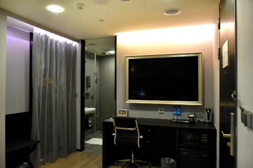 Ein Badezimmer in der Unterkunft FX Hotel Tainan