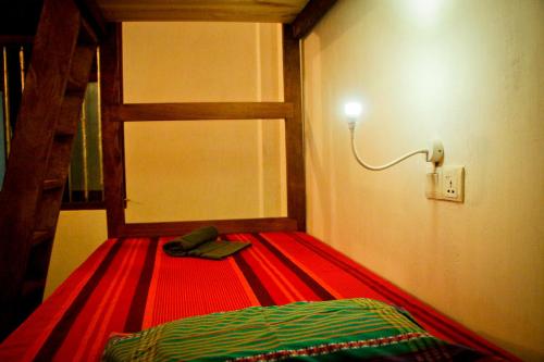 Una cama o camas en una habitación de Lala's Place