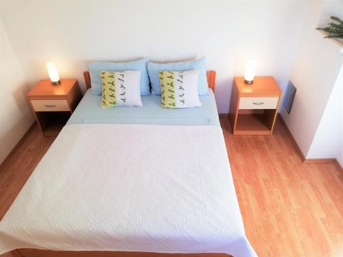 Ein Bett oder Betten in einem Zimmer der Unterkunft Apartment Anzotika